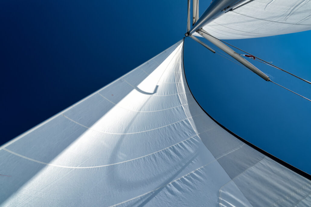 sails of a sailing yacht in the wind sailing on the ocean